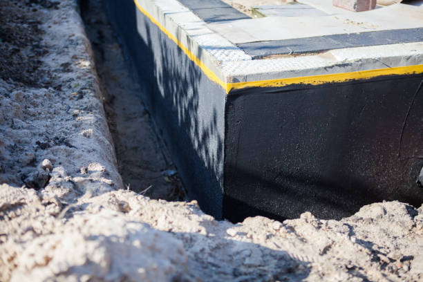 Professional Exterior Waterproofing technician working in Wallington, NJ